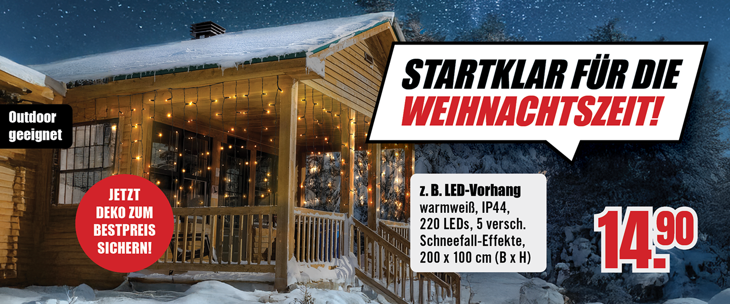 Werbebanner mit beleuchtetem Holzhaus im Schnee. Text: „Startklar für die Weihnachtszeit! Jetzt Deko zum Bestpreis sichern!“ Beworben wird ein LED-Vorhang mit 220 LEDs, IP44, 5 Schneefall-Effekte, 200 × 100 cm, Preis 14,90 €.